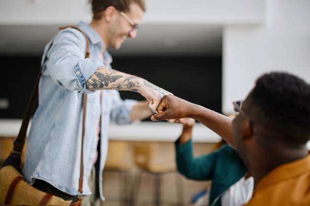 College students greet each other during an encounter