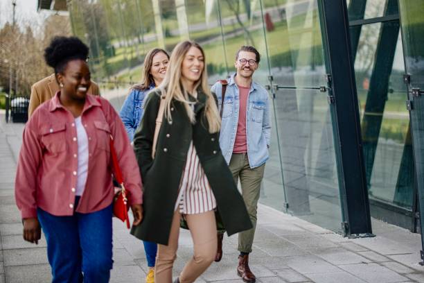 istock Group of international students having fun after studying 1331300210