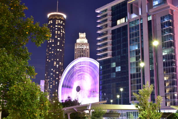 Ferris wheel spinning at night in Atlanta