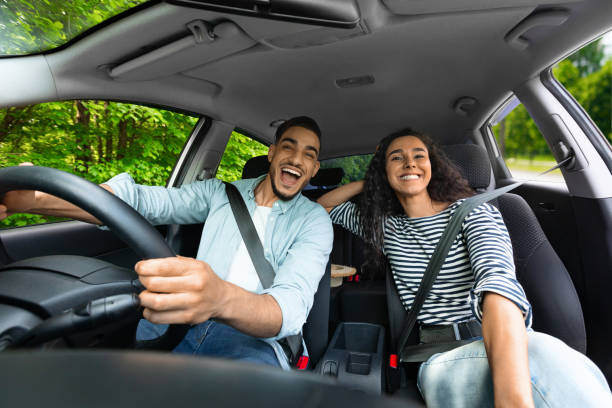 istock Emotional millennial couple enjoying journey by auto 1331302588
