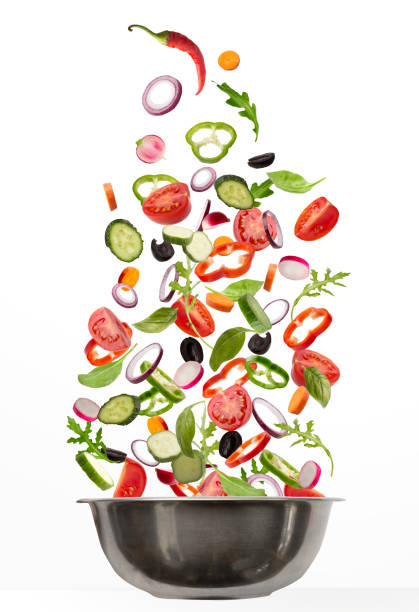 istock Fresh vegetables flying into cooking pot, isolated on white background 1331303987