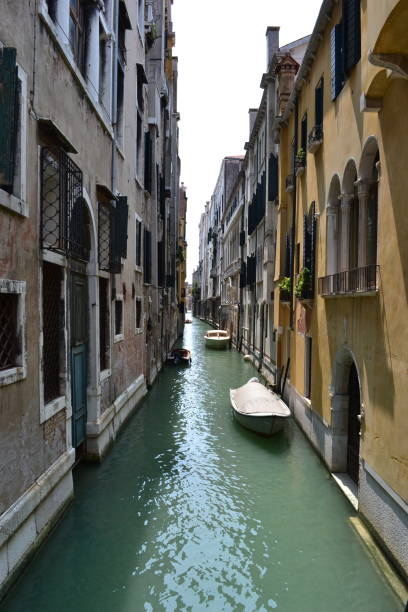 istock Venice canal with gondolas and a gorgeous view 1331308236