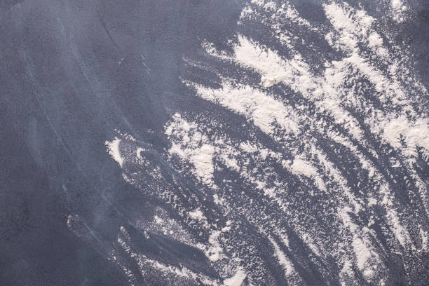 istock Baking or cooking background, flour on the dark background 1331308589
