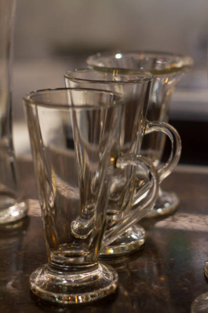 istock Close up empty glasses in restaurant natural light. selective focus and blur background. 1331315080