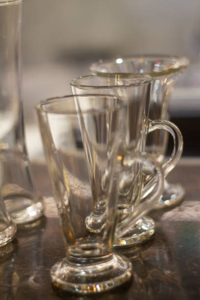 istock Close up empty glasses in restaurant natural light. selective focus and blur background. 1331315221