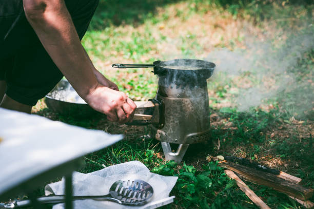 istock Outdoor cooking on portable camping stove 1331317558