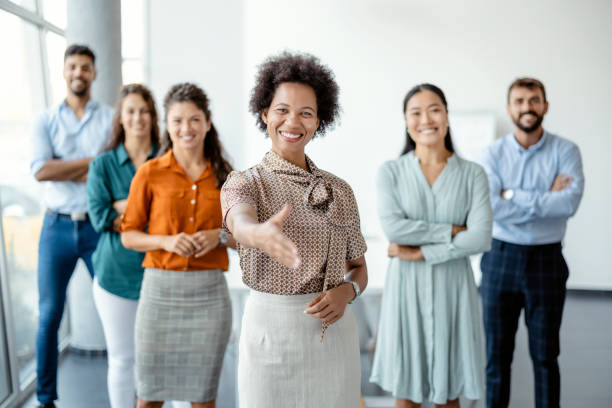 istock Businesswoman Offering Handshake 1331317854