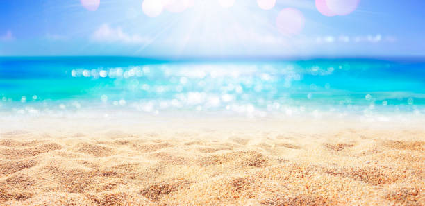 spiaggia - sabbia con oceano astratto e sfocato sullo sfondo - beach foto e immagini stock