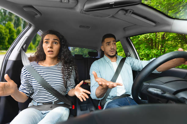 istock Indignant middle-eastern young couple having car accident 1331322293