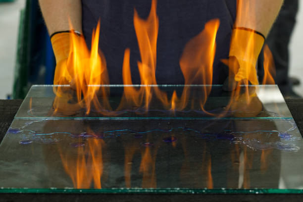 Close-up shot of hand holding a glowing candle, gently lighting a flame in a traditional oil lamp at a sacred shrine. The flicker of light symbolizes spiritual intention, inner peace, and the act of offering light to the divine. Rooted in cultural reverence and mu-te-lu belief, this serene ritual reflects a growing trend toward mindful practices, energy cleansing, and spiritual wellness
