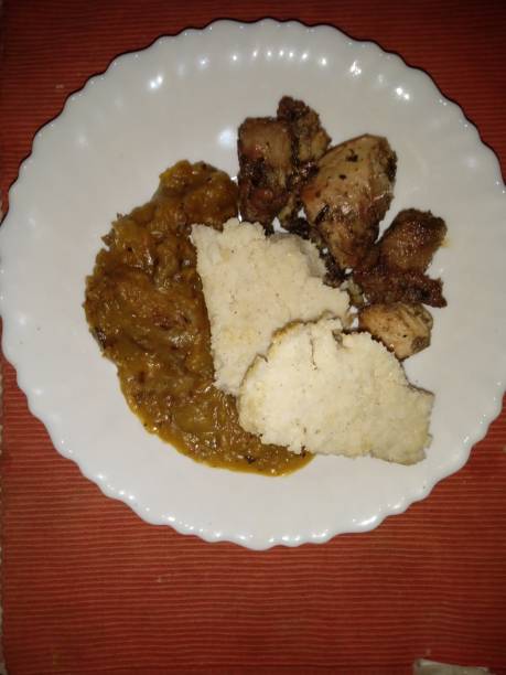 istock Rosemary chicken with marrow sauce and ugali 1331324096