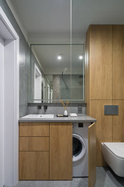 istock Modern bathroom with wood and granite 1331325740