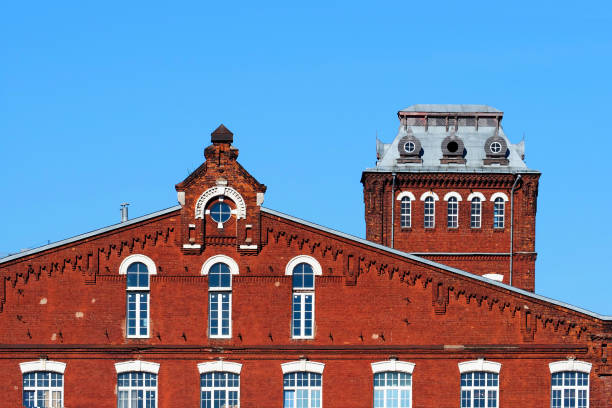 istock Old manufactory, red brick buildings, blue sky 1331328150