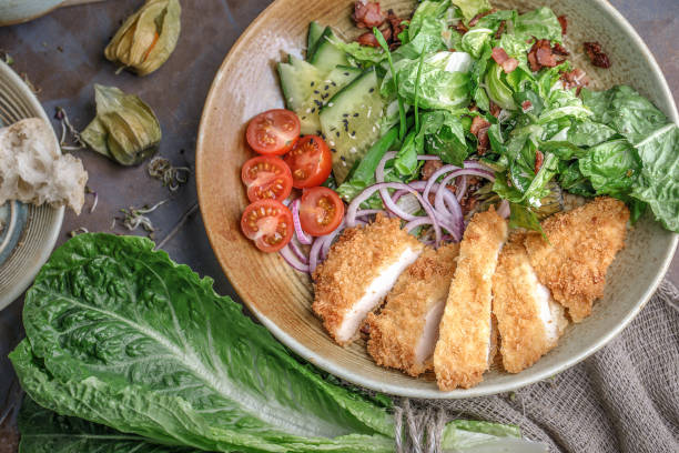 istock Delicious fresh salad with crispy grilled chicken breast 1331332999