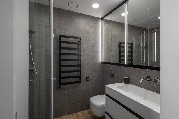 istock Modern minimalist bathroom interior design with grey stone tiles 1331333034