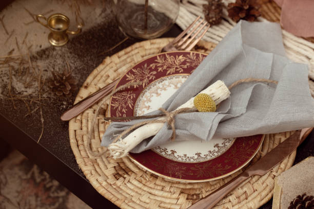 istock A table  designed for a boho style event with an eucalyptus, vintage plates and other rustic touches. On seaside in the sand dunes 1331333053