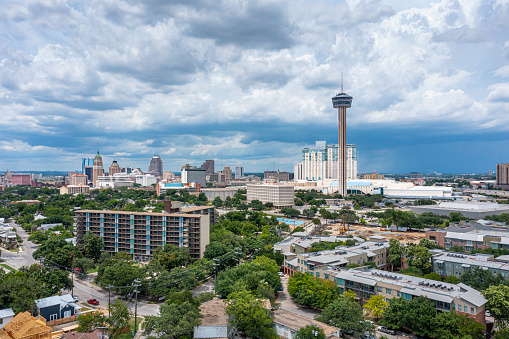 Drone angle view of San Antonio with afternoon thunderstorm.
