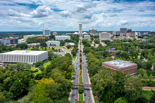 Drone angle view of Florida State Capitol with the city skyline.