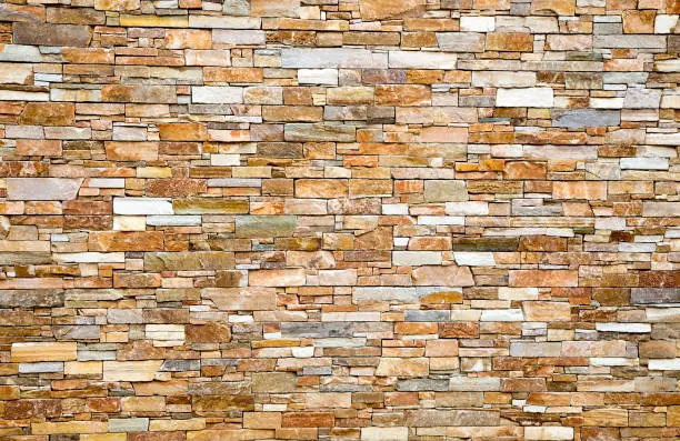 Photo of ochre stone wall