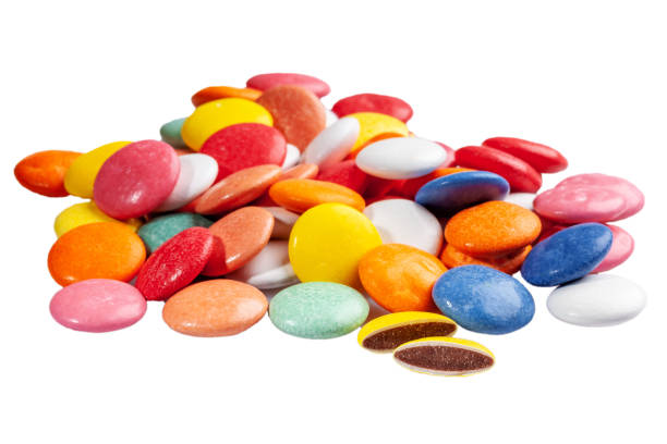 istock Chocolate dragees in multicolored sugar glaze isolated on white 1331334992