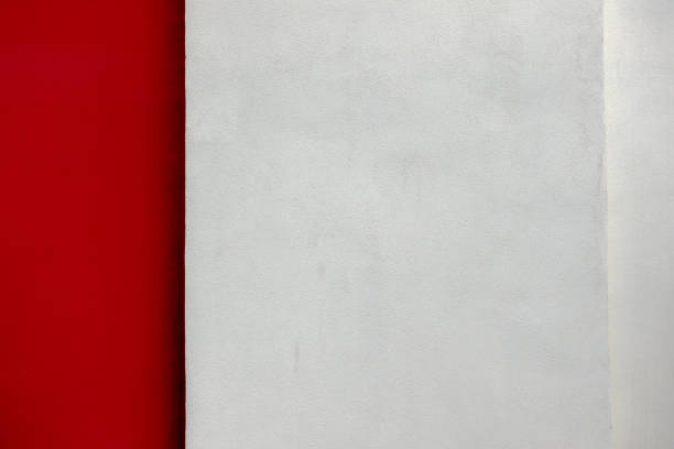 istock Two colors wall background. Red and light gray plaster wall backdrop 1331337133