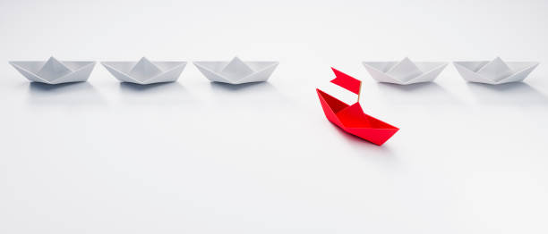 istock Paper boats - Thinking concept differently - Changing course - new ideas 1331337260