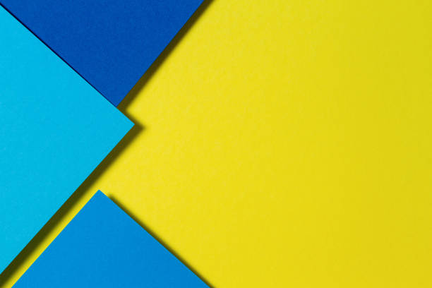 istock Abstract color papers geometry flat lay composition background with blue and yellow tones 1331338030