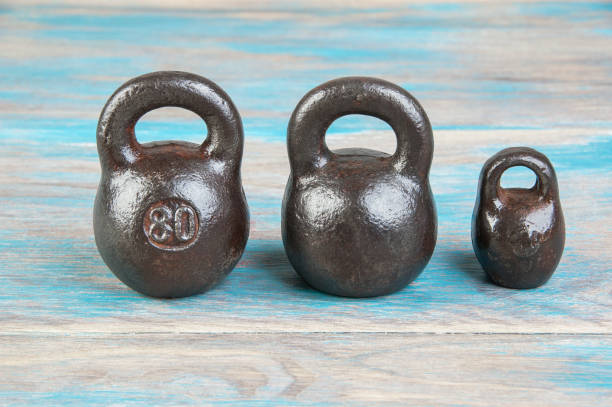 istock Three antique iron weights for scales. 1331340591