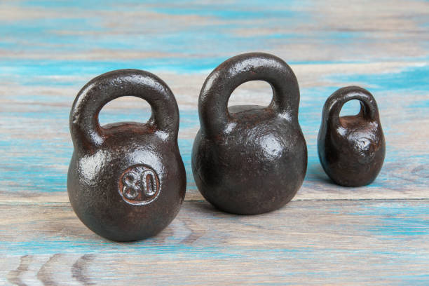 istock Three antique iron weights for scales. 1331340651