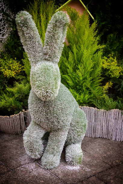 istock Design Easter decor park installed sculpture rabbit with standing ears vertical photo 1331348341