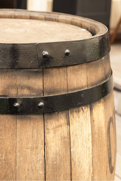istock light beige oak barrel with a hoop close-up vertically close-up 1331350487