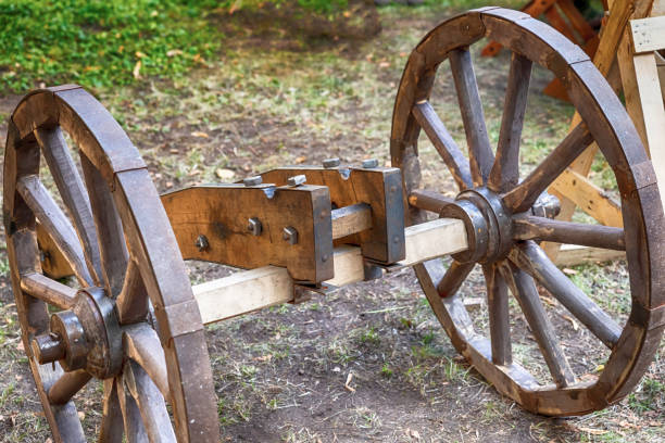 old wooden base for a cannon with large wheels