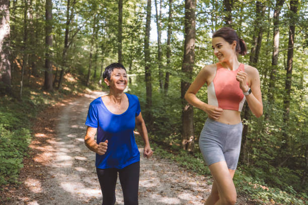 istock Young and old running together 1331354703