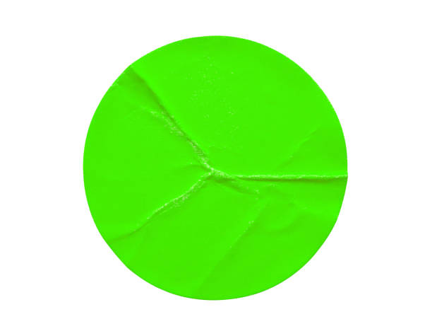istock Green round paper sticker label isolated on white background 1331365562
