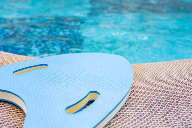 istock blue floating pad near a swimming pool 1331368095