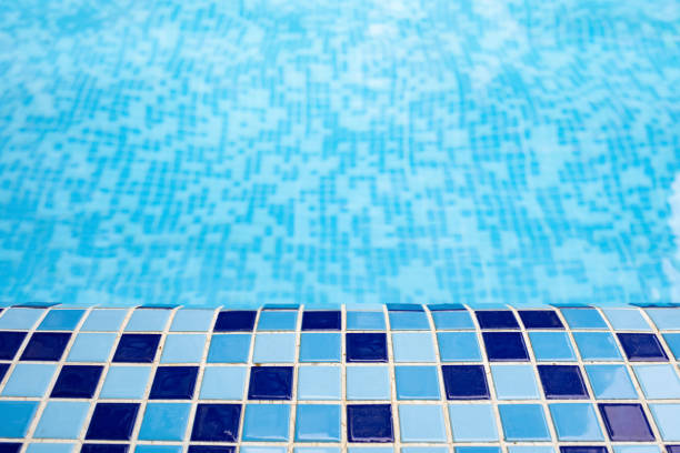 edge of a swimming pool in a sunny day