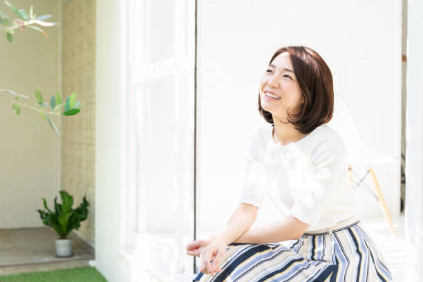 istock attractive asian woman relaxing 1331374067