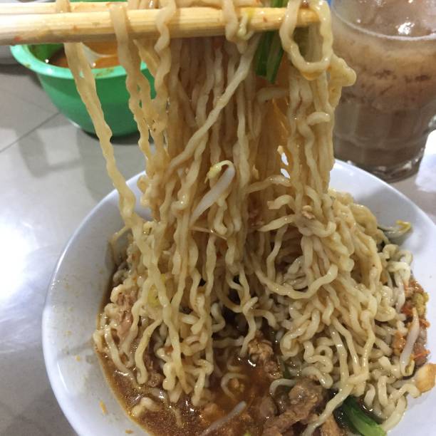 istock Delicious long boiled noodles served on a bowl. 1331382305