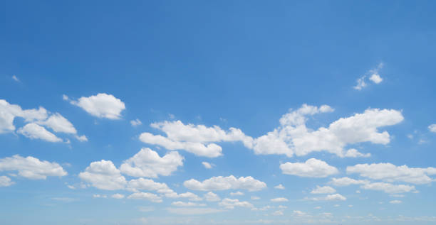 istock Clear blue sky with white fluffy clouds at noon. Day time. Abstract nature landscape background. 1331385214