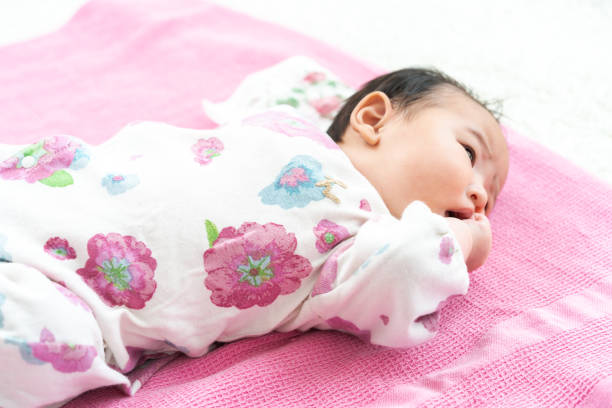 istock Sleeping baby on the floor 1331386292