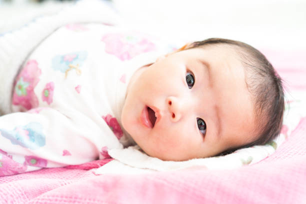 istock Sleeping baby on the floor 1331386309