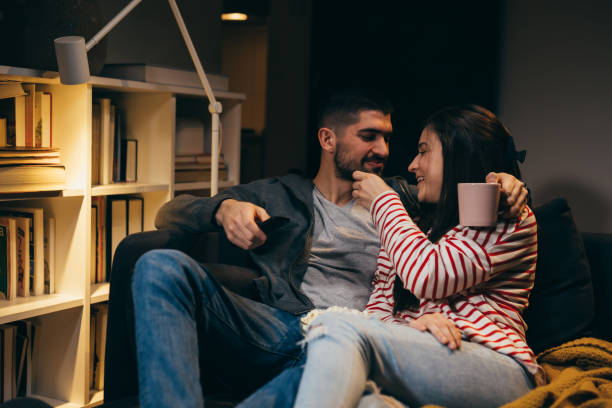 istock young beautiful couple at home 1331396347