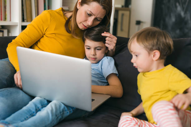istock mother and kids at home 1331396418
