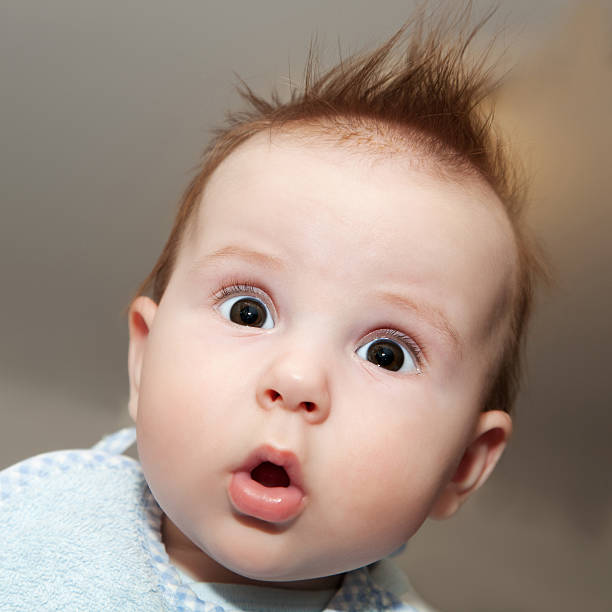 Funny Baby Expression Stock Photos, Pictures & Royalty-Free Images - iStock