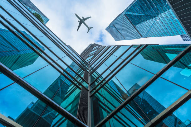istock plane flying over the skyscrapers 1331397292