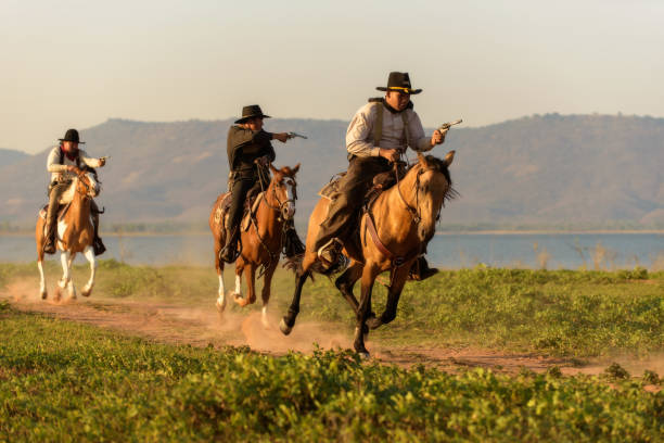 istock Cowboy riding a horse. 1331397519