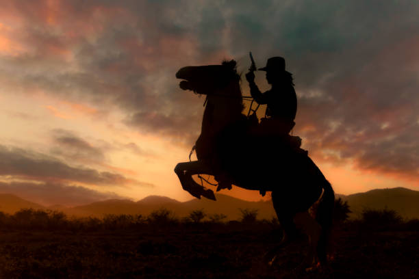 istock Cowboy riding a horse. 1331397525