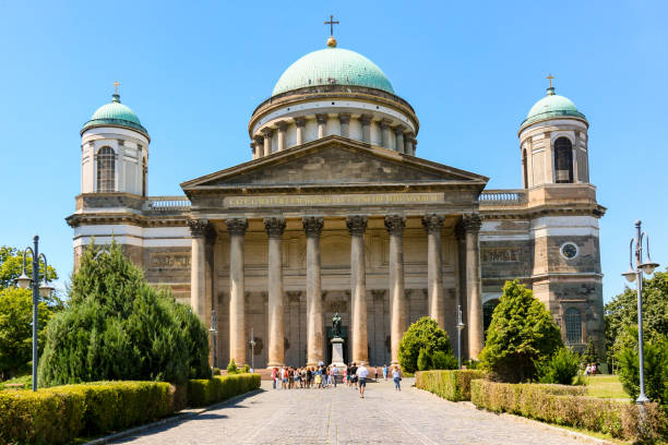 The catholic cathedral of Esztergom can be seen from afar with the bishopric in Hungary stock photo