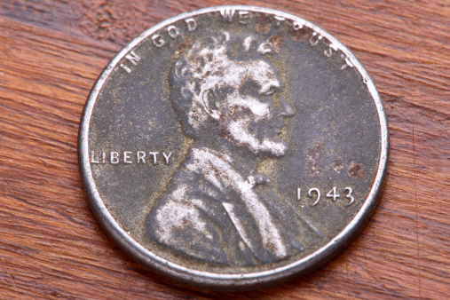 Close up of unusual 1943 Lincoln Head, Wheat Ears reverse, United States of America one cent coin made of steel