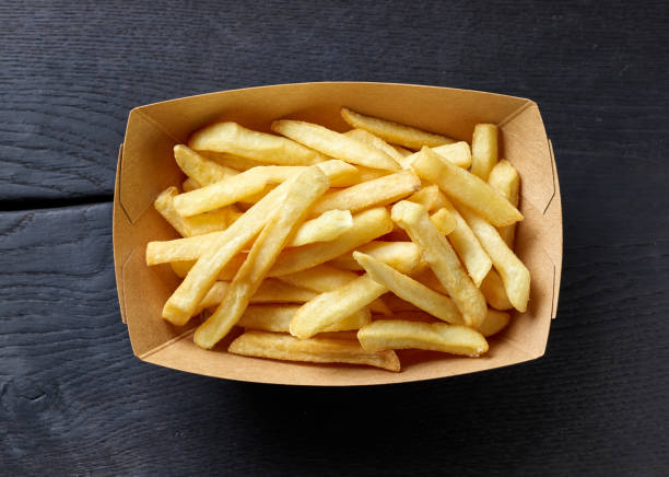 istock french fries in cardboard container 1331411064